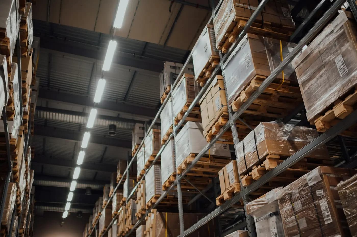 Boxed stock on pallets in a warehouse rack
